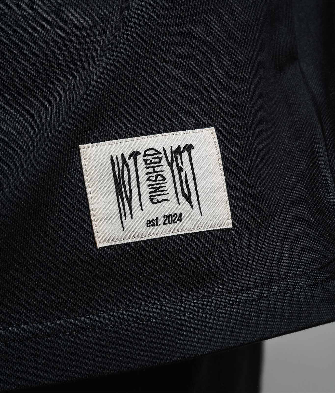 nofy-longsleeve-logo-world-schwarz-patch