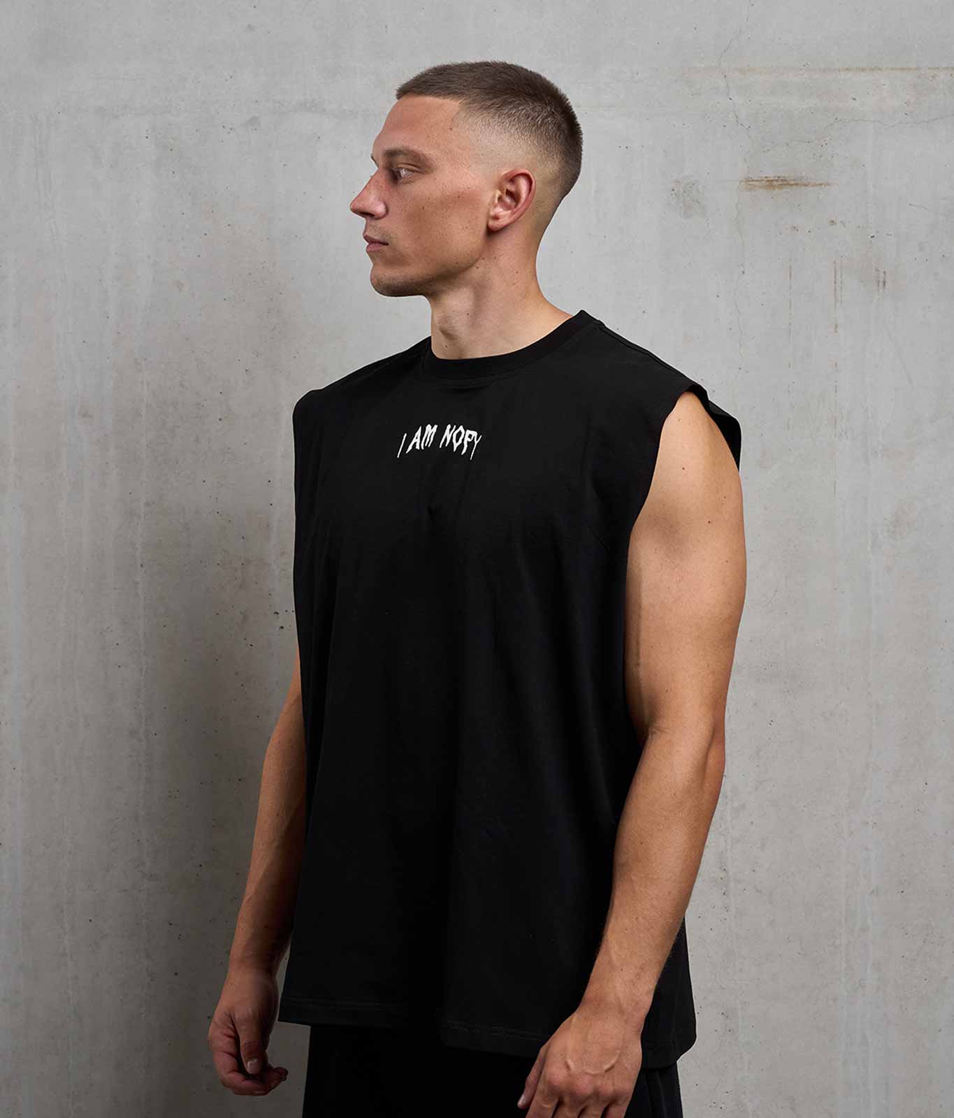NOFY Tank Top Herren Schwarz I Am NOFY Core, Seitenansicht Oversize Fit