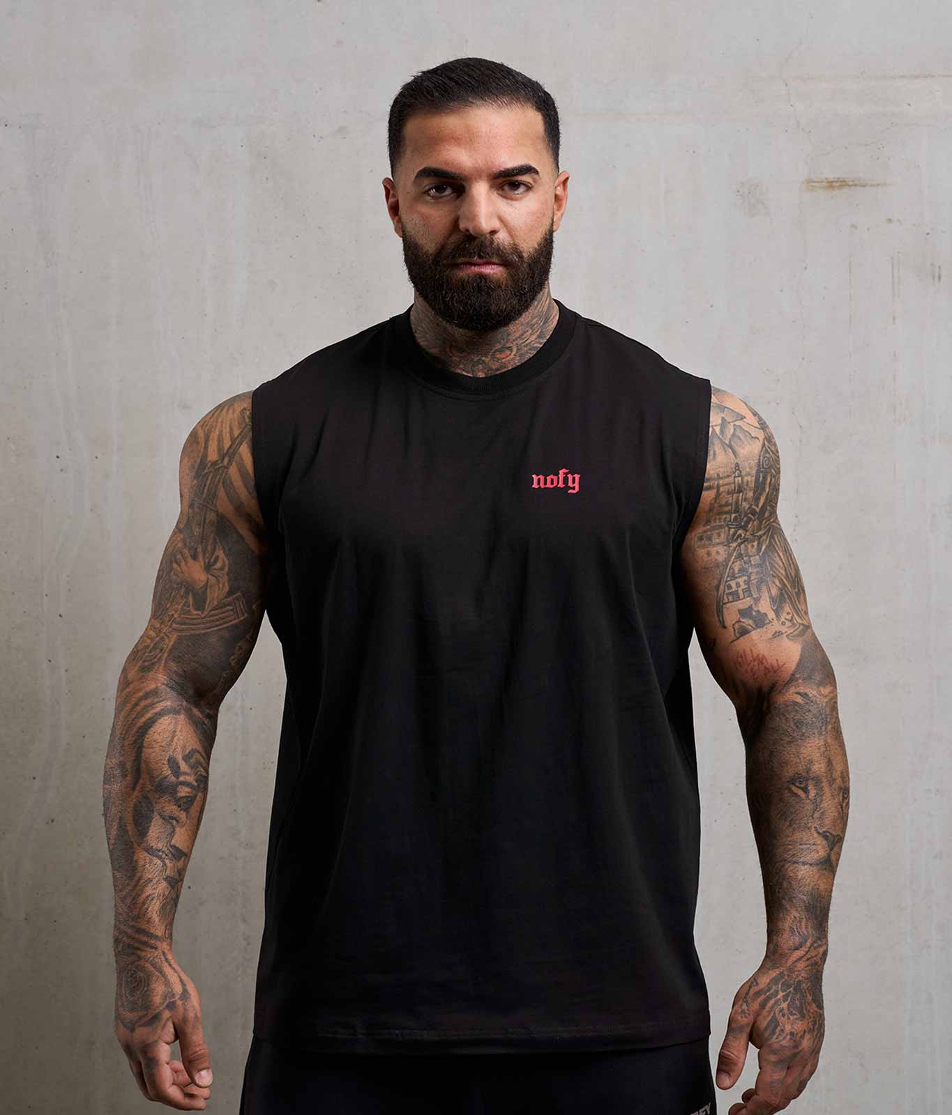 NOFY Oversize Tank Top Herren Schwarz Unfinished, Frontansicht mit Logo