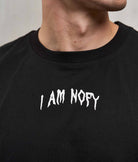 Nahaufnahme I Am NOFY Print auf NOFY Tank Top Schwarz Core, Detailansicht